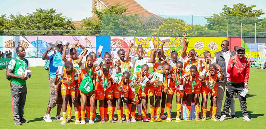 From the grassroots, this coach’s unique ways are growing women’s football